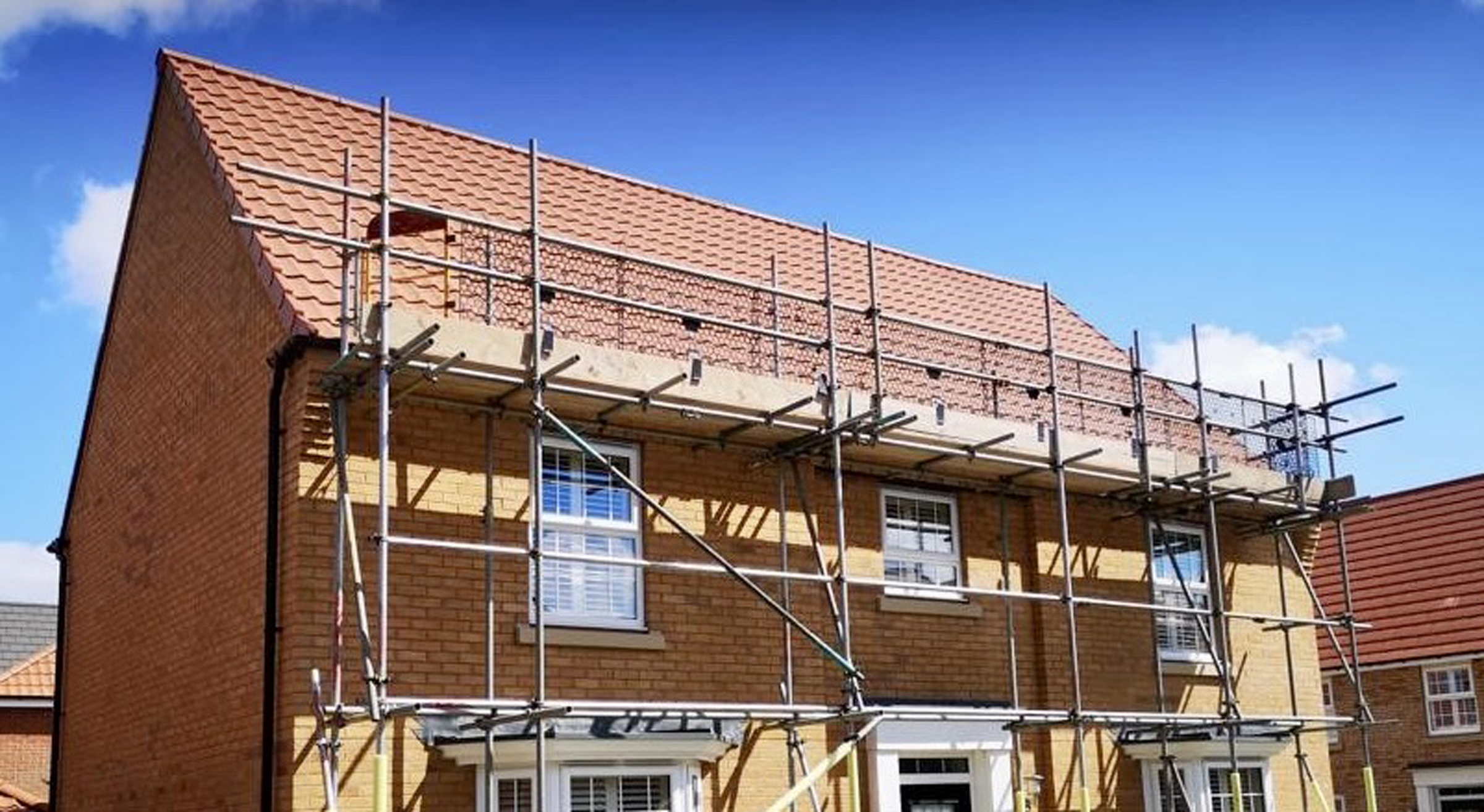 House with Scaffolding to roof